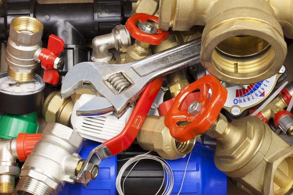 Assortment of tools used in installation of hot water cylinder