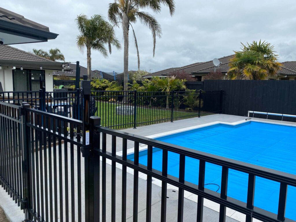 Pool with pool fencing