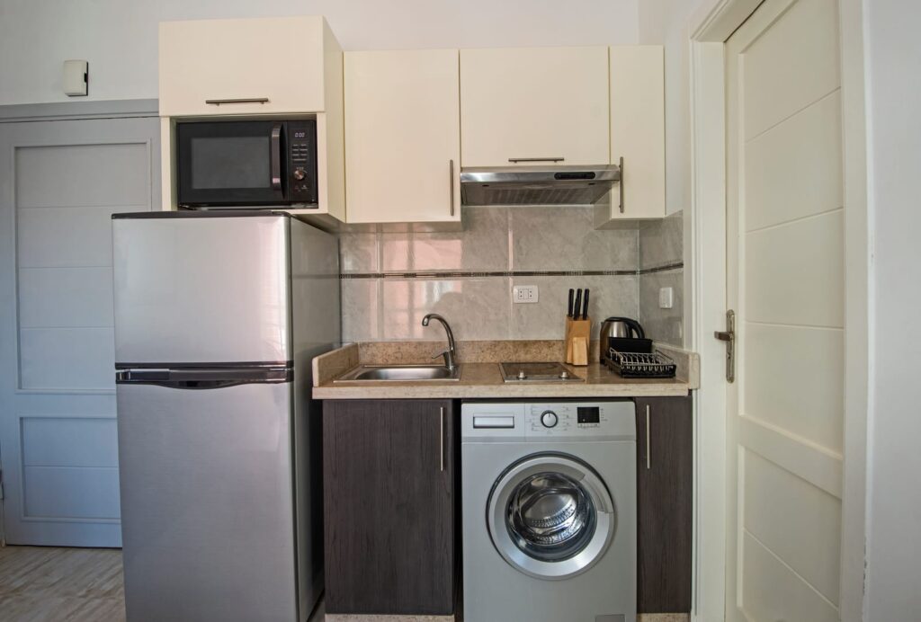 appliances in kitchen and laundry apartment